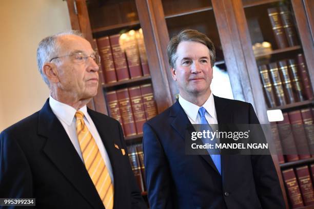 Supreme Court associate justice nominee Brett Kavanaugh attends a meeting with Chuck Grassley, R-IA, chairman of the Senate Judiciary Committee, at...