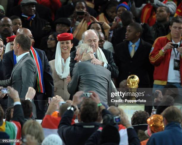 The Netherlands manager Bert Van Marwijk is consoled by FIFA President Sepp Blatter after the FIFA World Cup Final between the Netherlands and Spain...