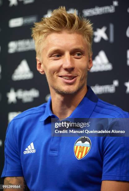 Daniel Wass faces the media during his presentation as a new player for Valencia CF at Paterna Training Centre on July 10, 2018 in Valencia, Spain.