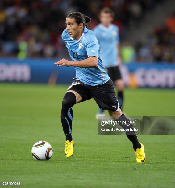 Martin Caceres of Uruguay in action during the FIFA World Cup Semi Final between Uruguay and the Netherlands at the Cape Town Stadium on July 6, 2010...