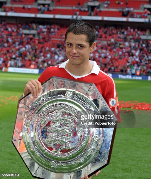 Javier Hernandez of Manchester United celebrates with the trophy after the FA Community Shield between Chelsea and Manchester United at Wembley...