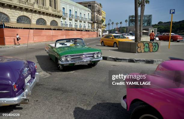 Taxi remains parked in Havana on June 10, 2018. - Cuba gave Tuesday a new green light to private work, after a setback of almost a year, now...