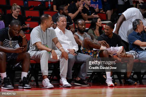 Assistant Coach Sam Cassell of the LA Clippers and John Wall of the the Washington Wizards enjoy the game between the the Cleveland Cavaliers and the...