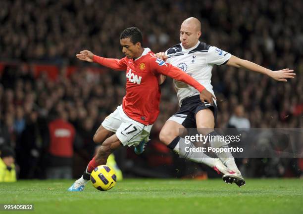 Alan Hutton of Tottenham Hotspur challenges Nani of Manchester United during a Barclays Premier League match at Old Trafford on October 30, 2010 in...