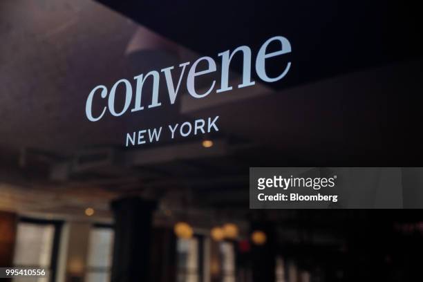 Signage is displayed at the Convene workspace flagship location in New York, U.S., on Monday, July 2, 2018. Convene, a New York-based real estate...