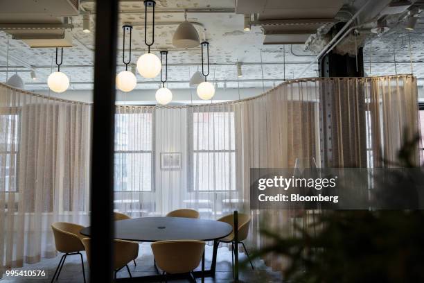 Meeting table sits at the Convene workspace flagship location in New York, U.S., on Monday, July 2, 2018. Convene, a New York-based real estate...