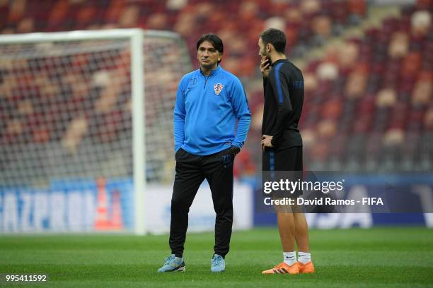 Zlatko Dalic, Head coach of Croatia speaks to Milan Badelj during the Croatia Training Session at the Luzhniki Stadium on July 10, 2018 in Moscow,...