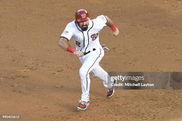 Adam Eaton of the Washington Nationals runs to second base during a baseball game against the Boston Red Sox at Nationals Park on July 2, 2018 in...