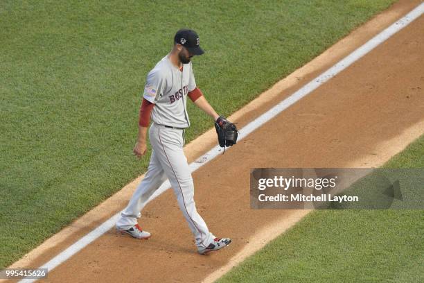 Rick Porcello of the Boston Red Sox walks back to the dug out during a baseball game against the Washington Nationals at Nationals Park on July 2,...