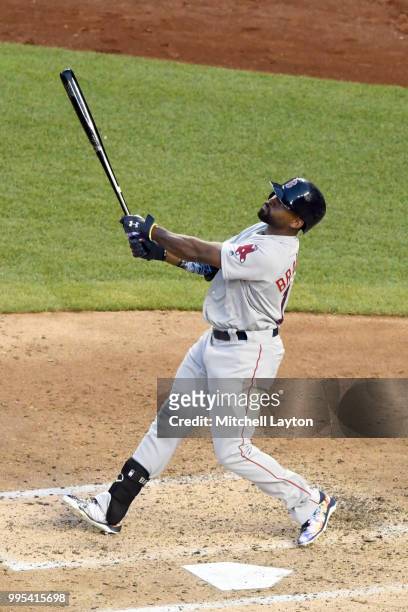 Jackie Bradley Jr. #19 of the Boston Red Sox takes a swing during a baseball game against the Washington Nationals at Nationals Park on July 2, 2018...