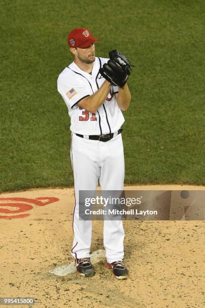 Max Scherzer of the Washington Nationals pitches during a baseball game against the Boston Red Sox at Nationals Park on July 2, 2018 in Washington,...