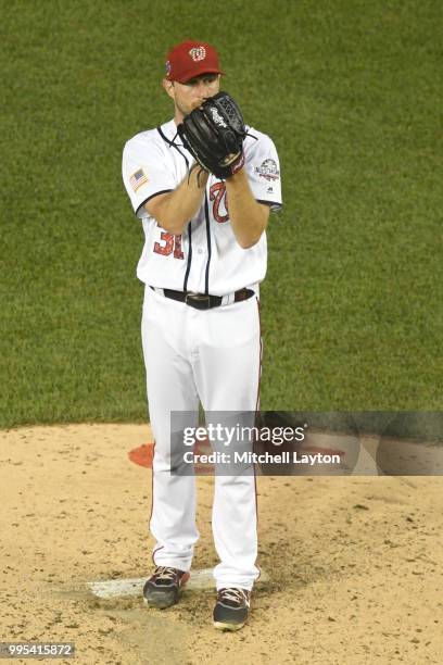 Max Scherzer of the Washington Nationals pitches during a baseball game against the Boston Red Sox at Nationals Park on July 2, 2018 in Washington,...