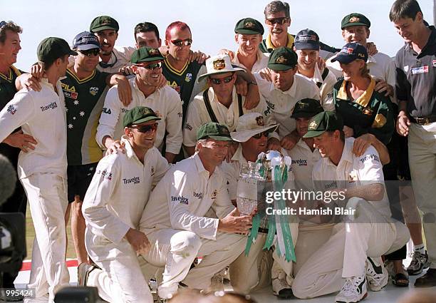 Australia celebrates with the NPower and Ashes Trophy after winning the 5th Ashes Test between England and Australia at The AMP Oval, London....