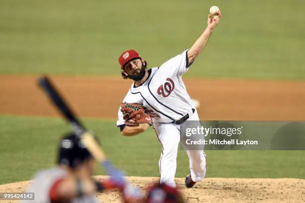 Tim Collins of the Washington Nationals pitches during a baseball game against the Boston Red Sox at Nationals Park on July 2, 2018 in Washington,...