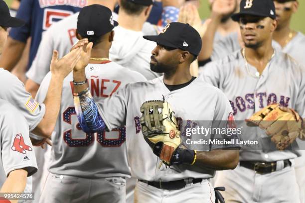 Jackie Bradley Jr. #19 of the Boston Red Sox celebrates a win after a baseball game against the Washington Nationals at Nationals Park on July 2,...