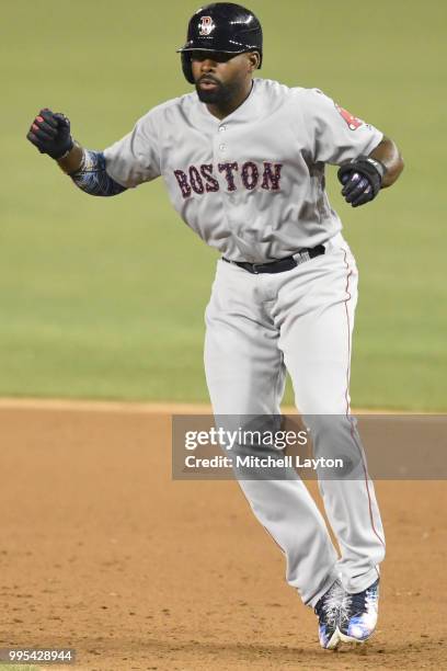 Jackie Bradley Jr. #19 of the Boston Red Sox leads off first base during a baseball game against the Washington Nationals at Nationals Park on July...