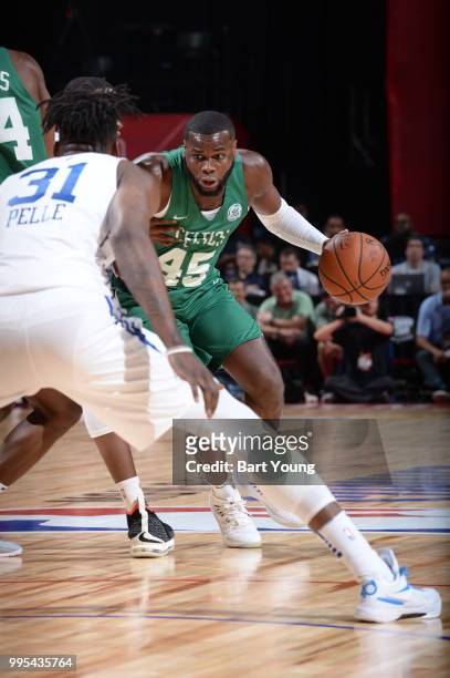 Kadeem Allen of the Boston Celtics handles the ball against the the Philadelphia 76ers during the 2018 Las Vegas Summer League on July 6, 2018 at the...