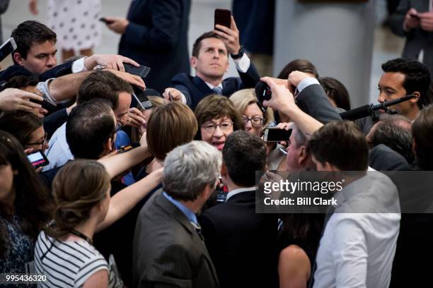 Reporters swarm Sen. Susan Collins, R-Maine, as she arrives for the Senate Republicans' policy lunch in the Capitol on Tuesday, July 10 the day after...
