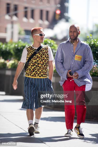 Taylor Okata, Matthew Henson during New York Fashion Week Mens Spring/Summer 2019 on July 9, 2018 in New York City. Taylor wears a leopard print...