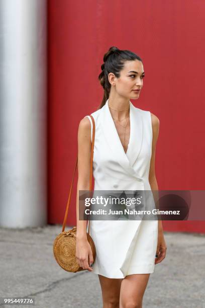 Estela Grande wears Yves Saint Laurent shoes, Zara dress and Gota de Agua handbag during the Mercedes Benz Fashion Week Spring/Summer 2019 at IFEMA...
