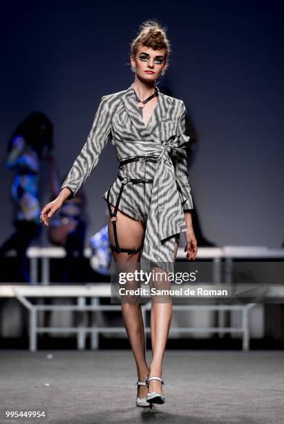 Model walks the runway during the Ana Loking show at Mercedes Benz Fashion Week Madrid Spring/Summer 2019 on July 10, 2018 in Madrid, Spain.