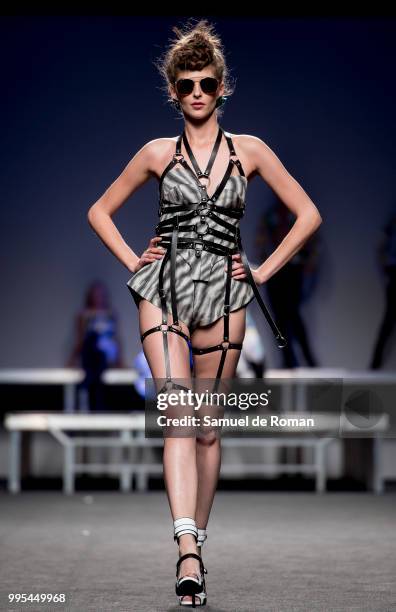 Model walks the runway during the Ana Loking show at Mercedes Benz Fashion Week Madrid Spring/Summer 2019 on July 10, 2018 in Madrid, Spain.