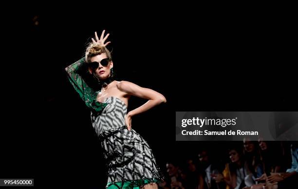 Model walks the runway during the Ana Loking show at Mercedes Benz Fashion Week Madrid Spring/Summer 2019 on July 10, 2018 in Madrid, Spain.