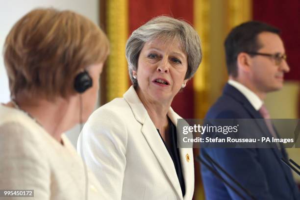 Prime Minister Theresa May during a press conference with German chancellor Angela Merkel and Polish Prime Minister, Mateusz Morawiecki during the...