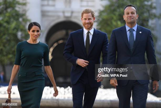 Meghan, Duchess of Sussex and Prince Harry, Duke of Sussex are greeted by the Taoiseach of Ireland Leo Varadkar, as they arrive at the start of a...