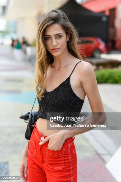 Nora Vara wears Nike trainers, Zara trousers and shirt during the Mercedes Benz Fashion Week Spring/Summer 2019 at IFEMA on July 10, 2018 in Madrid,...