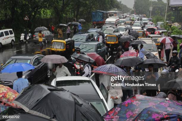 Traffic jam on Ghodbunder road near Kajupada Village on July 9, 2018 in Thane, India. Indias financial capital and its surrounding districts were in...