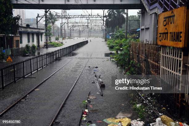 Water logging on tracks at Thane railway station on July 9, 2018 in Thane, India. Indias financial capital and its surrounding districts were in for...