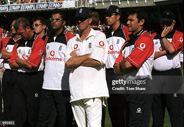 A dejected England team look on after defeat at the 5th Ashes Test between England and Australia at The AMP Oval, London. Mandatory Credit: Tom...