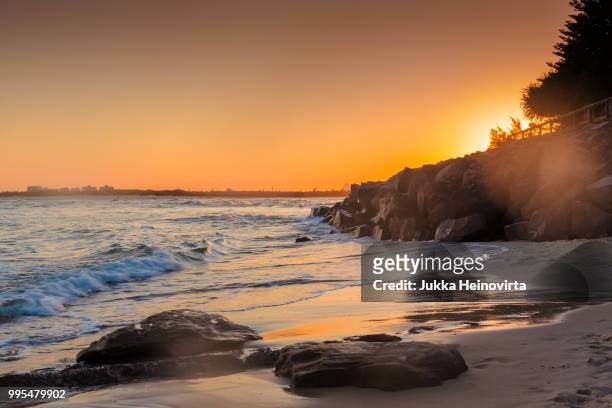 caloundra rocks in the sunset - caloundra stock pictures, royalty-free photos & images