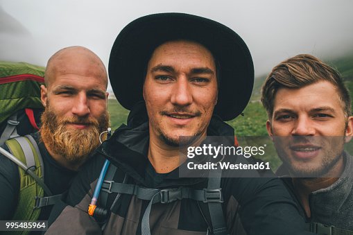 Group of travellers taking a selfie Group of travellers taking a selfie