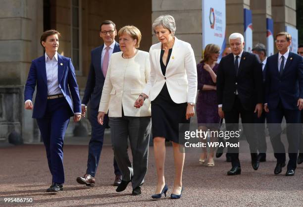 Polish Prime Minister Mateusz Morawiecki, German chancellor Angela Merkel and Prime Minister Theresa May arrive for a press conference with Polish...
