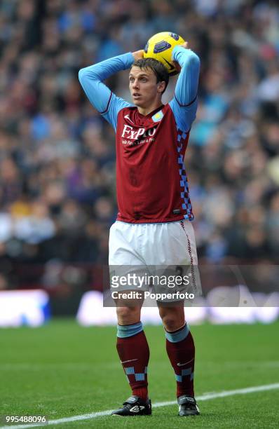 Stephen Warnock of Aston Villa takes a throw in during the Barclays Premier League match between Aston Villa and Birmingham City at Villa Park on...