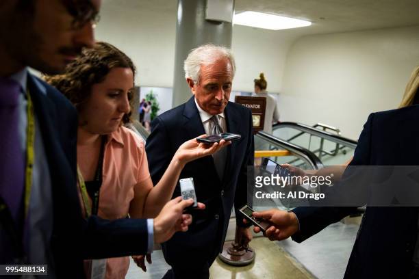 Sen. Bob Corker speaks to reporters as he heads to the weekly Senate Republicans policy luncheon, on Capitol Hill, on July 10, 2018 in Washington, DC.