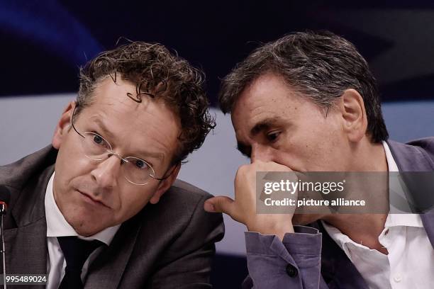 Jeroen Dijsselbloem , President of the Eurogroup, and Euclid Tsakalotos, Greek minister of the finances, speak at a press conference in the Greek...