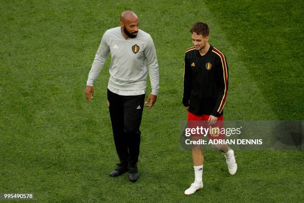 Belgium's assistant coach Thierry Henry and Belgium's forward Adnan Januzaj speak prior to the Russia 2018 World Cup semi-final football match...