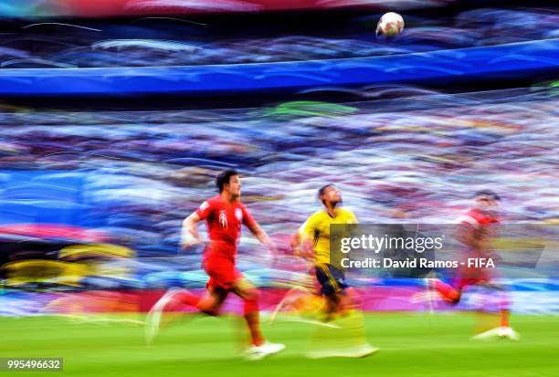Harry Maguire of England and Marcus Berg of Sweden competes for the ball during the 2018 FIFA World Cup Russia Quarter Final match between Sweden and...