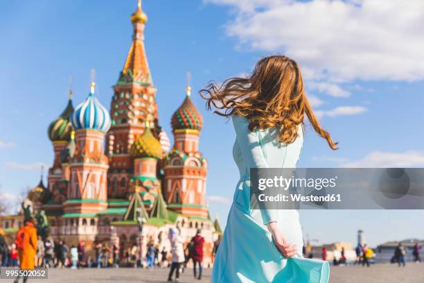 russia, moscow, red square, teenage girl rotating - russia travel stock pictures, royalty-free photos & images