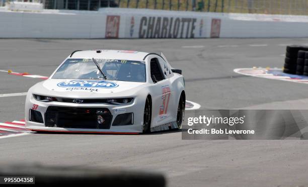 Chris Buescher makes his way through the backstretch during testing for The Roval at Charlotte Motor Speedway on July 10, 2018 in Charlotte, North...