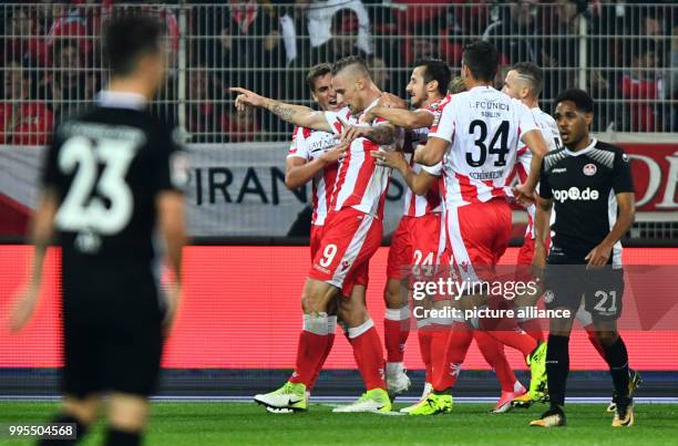 Berlin's players celebrate Sebastian Polter's goal for a 3:0 lead during the German 2. Bundesliga match between 1. FC Union Berlin and 1. FC...