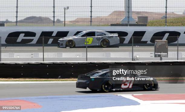 Ryan Newman in the 31 car chases down Chase Elliott in the number 9 car during testing at The Roval at Charlotte Motor Speedway on July 10, 2018 in...