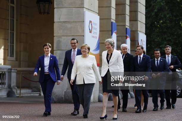 Ana Brnabic, Serbia's prime minister, from left, Mateusz Morawiecki, Poland's prime minister, Angela Merkel, Germany's chancellor, and Theresa May,...