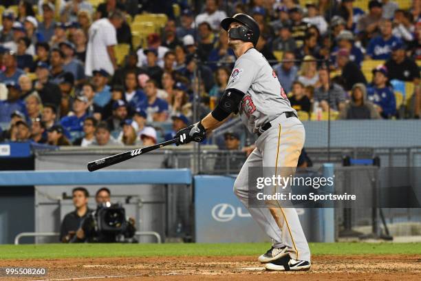 Pittsburgh Pirates infielder David Freese hits a home run during a MLB game between the Los Angeles Dodgers and the Los Angeles Angels of Anaheim on...