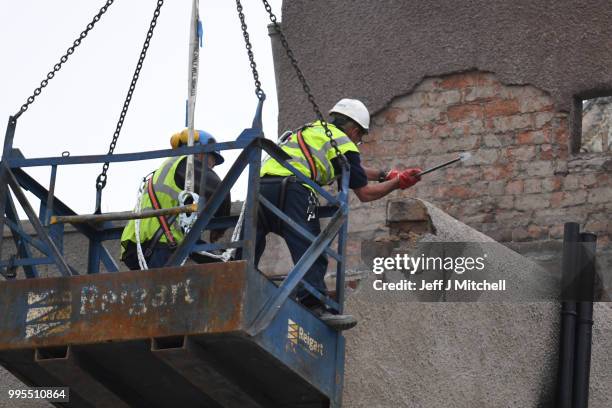 Workers begin the demolition of the burnt-out Glasgow Art School on July 10, 2018 in Glasgow, Scotland. The grade A listed building was undergoing a...