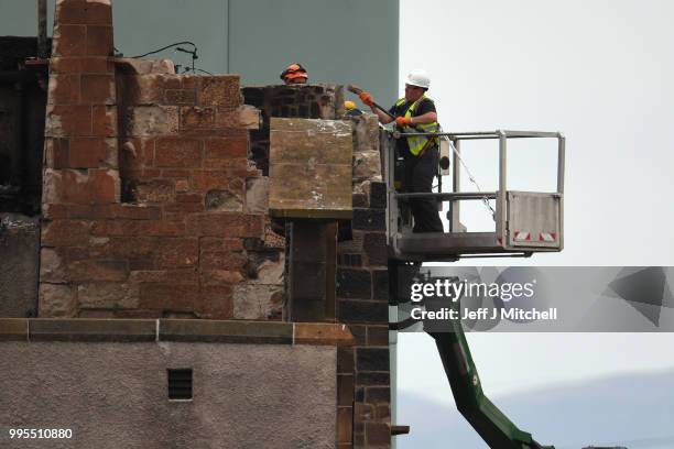 Workers begin the demolition of the burnt-out Glasgow Art School on July 10, 2018 in Glasgow, Scotland. The grade A listed building was undergoing a...