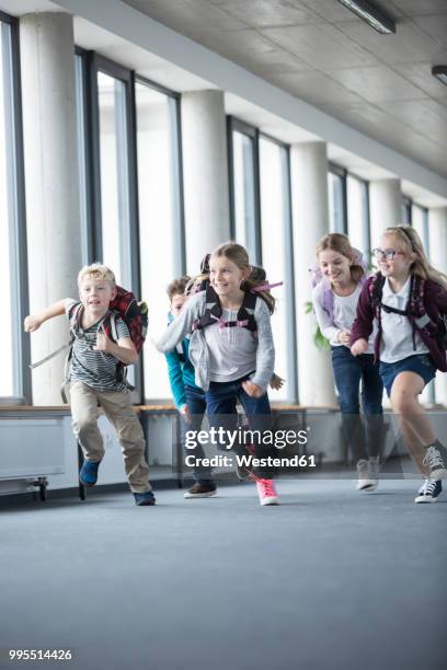 Kid Rushing Children Running Down School Corridor Photos and Premium High Res ...